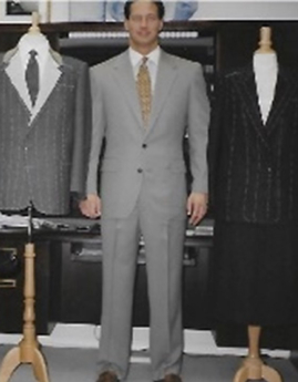 Man Standing Wearing Gray Suit
